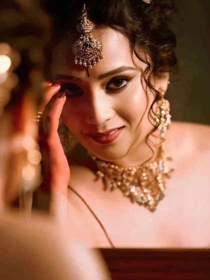 A close-up shot capturing the intensity of the eye makeup. This is a perfect look for someone who wants to make a statement.