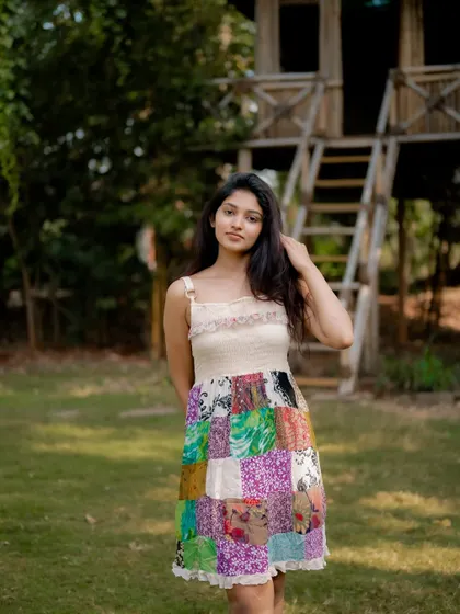 A duplicate of image 292, this portrait of actress Rachana Inder in a park has a natural and authentic feel.