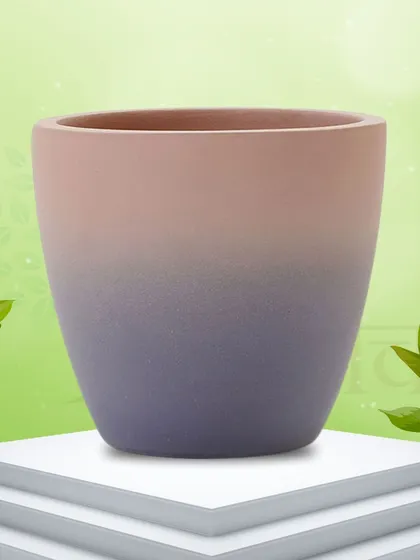 I love this Smoky Terracotta Planter with its beautiful purple ombre effect and matte finish. It's a modern and elegant handmade pot for your home.