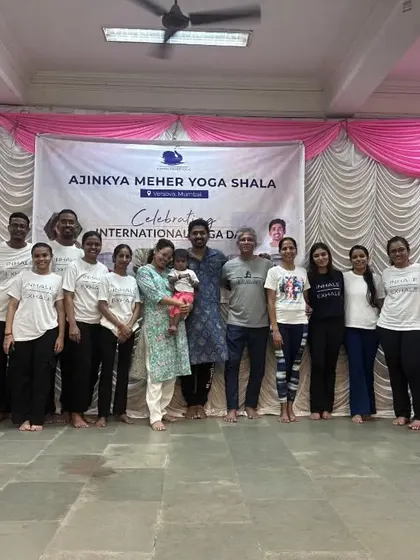 A group photo with our amazing team of volunteers who helped make the International Yoga Day event possible.