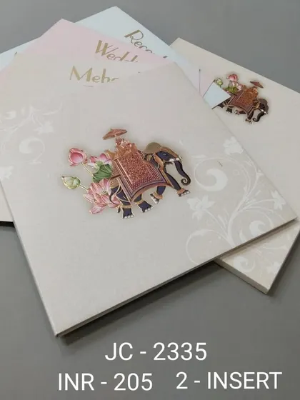 A simple and elegant invitation featuring a decorated elephant and lotus motif. This card comes with multiple inserts for your various wedding functions.