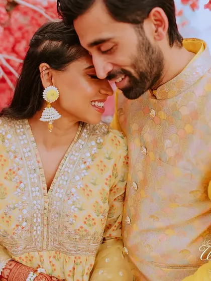 An intimate close-up of the couple, their smiles reflecting their deep affection for each other.