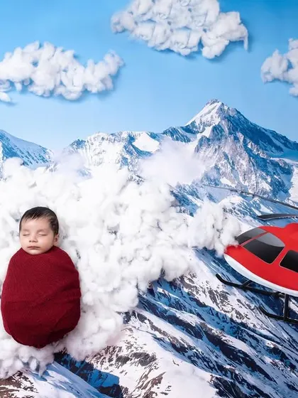 They asked, I delivered. For a family in the aerosports business, we created this custom set with their newborn flying high above the Himalayas.