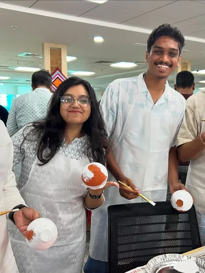This group is ready to start their pot painting adventure! I provide all the materials and guidance needed to turn a plain pot into a work of art.