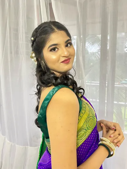 A happy and confident bridesmaid, ready for her sister's wedding.