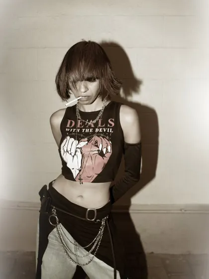 A cool and rebellious pose with a vintage, grainy finish. This style is perfect for building a specific character or brand identity.