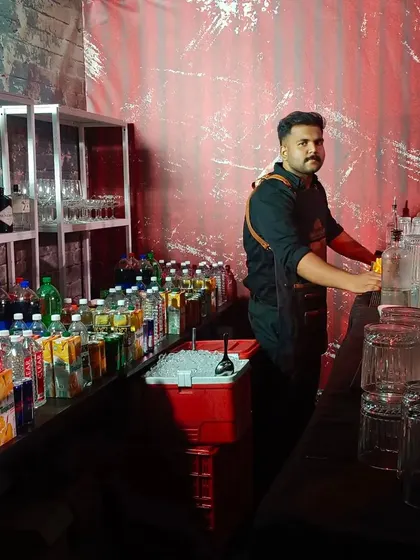 Our professional bartender manning the station at a corporate event for Barsquare India at the JW Marriott. We ensure seamless service for your company's important functions.