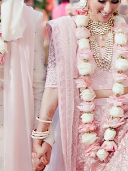 A soft and romantic jaimala design using pastel pink and white roses. I can create these garlands to match lighter, contemporary bridal wear for a cohesive and elegant look.