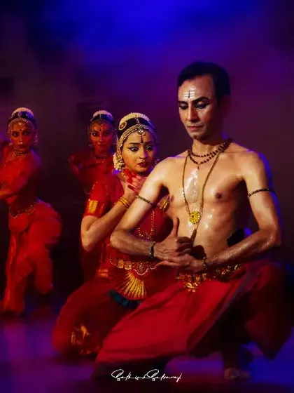 A powerful group formation from the Natyanjali Festival in Coimbatore, with my Guru at the center. The dramatic lighting enhances the theatricality of the production.