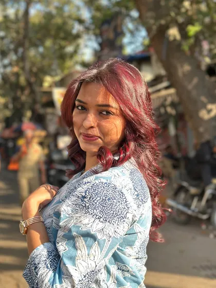 Taking the new cherry red hair out on the streets. This outdoor shot shows how vibrant the color looks in natural sunlight.