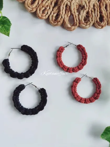 For a classic look, here are the macrame hoop earrings in black and rust. These colors are versatile and can be dressed up or down.