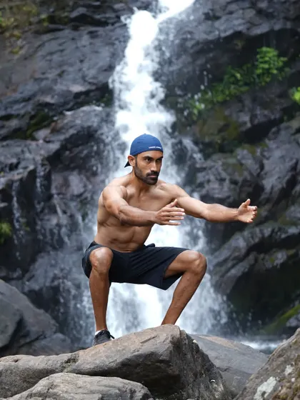 Taking my work outdoors. A simple bodyweight squat becomes a moment of connection with nature when you're in front of a waterfall. Movement is medicine.