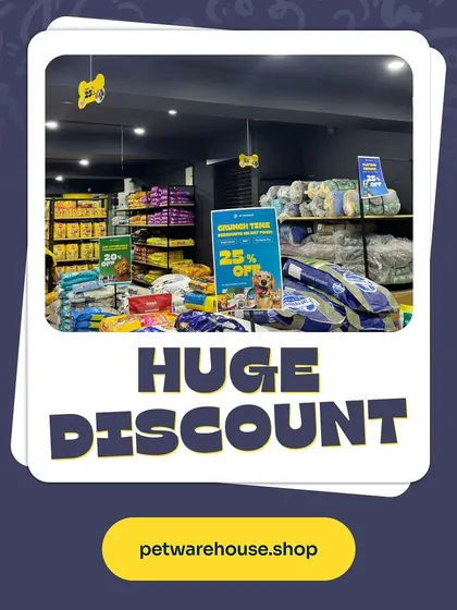 We are committed to offering great value, with huge discounts available throughout the store. Here you can see bulk bags of pet food stacked high and ready for you to save.