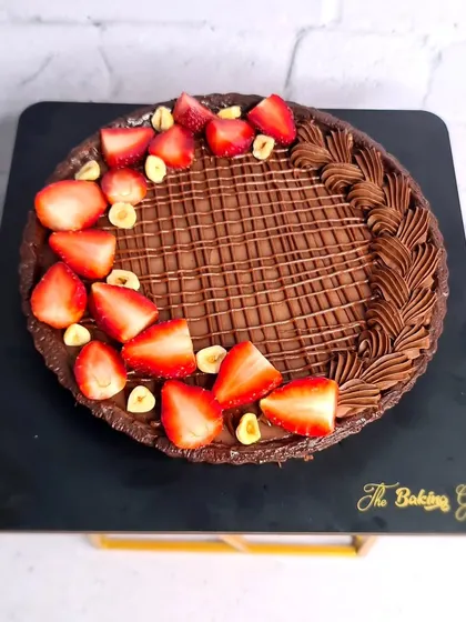 My Nutella Strawberry Tart is a fan favorite. It has a chocolate tart shell, a generous layer of Nutella, and is decorated with fresh strawberries and hazelnuts.