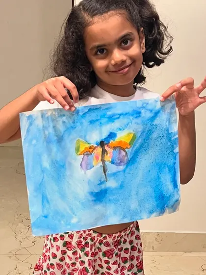 Another beautiful butterfly masterpiece! It's wonderful to see how each child brings their own unique color choices and style to the same project.