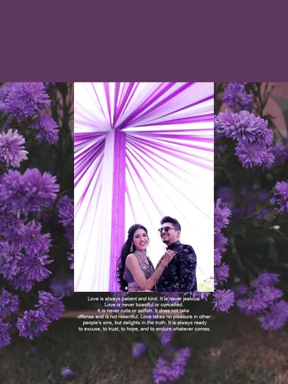 A romantic portrait of a couple framed by purple flowers, matching the theme of their Sangeet or Mehendi.