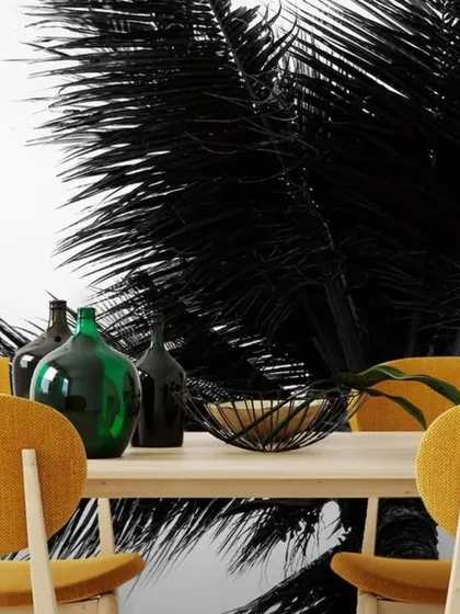 A bold, high-contrast wallpaper featuring black palm leaves against a white background. This design creates a dramatic and modern tropical look, perfect for a statement dining area or entryway.