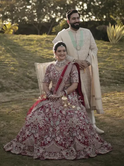 Harshita and Himij in a stunning outdoor portrait. Their story is a testament to finding a partner who shares your rhythm, rooted in seva and nurtured in knowledge.