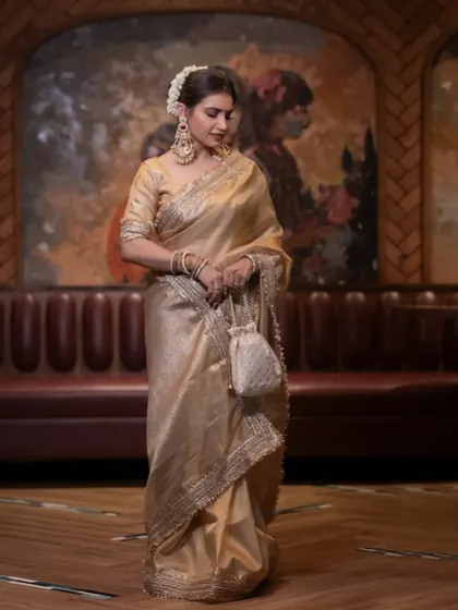 A full shot showing the beautiful setting and the timeless elegance of the entire look.