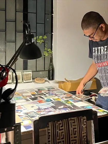 Artist Krishanu sequencing rush prints for a book project late one evening. Our studio is a place where ideas are kindled at all hours.