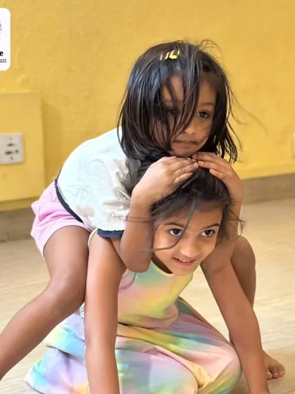 Playful collaboration during a summer workshop. These moments of fun and connection are what make the experience memorable.