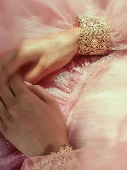 A beautiful shot of my handcrafted 18k gold cuff, designed with a delicate, lace like texture. This piece is meant to be a statement of artistry, both bold and feminine.