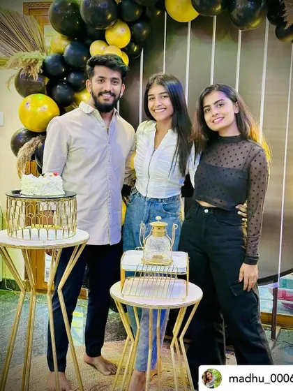 Friends enjoying the stylish black and gold birthday party.
