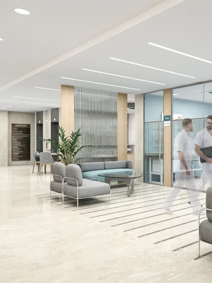 This rendering of a waiting area in the Central Park Polyclinic shows a clean, modern aesthetic with comfortable seating and biophilic touches. The space is designed for calm and efficient outpatient care.