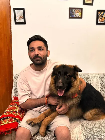 A guest with his German Shepherd. We love it when owners are as involved and loving as we are.