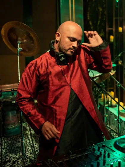 Lost in the music. A candid moment of me feeling the beat during a wedding set.