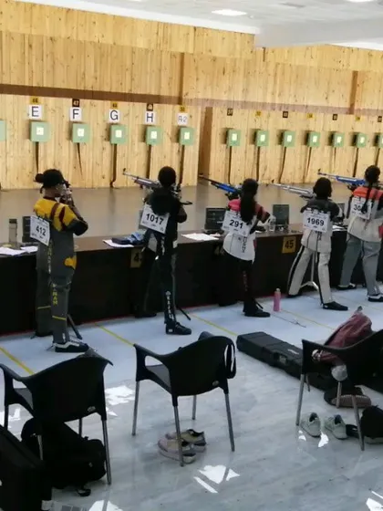 A view from behind the firing line during the 64th National Shooting Championship, showing the scale of a major competition.