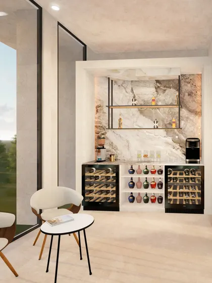 This self-service snack bar combines luxury and convenience. I used Italian stone marble for the backsplash and a micro-concrete frame, creating a sophisticated nook with integrated wine fridges for refreshments.