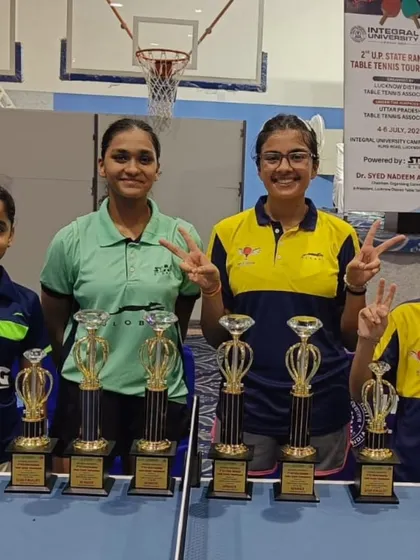 Our champions posing with their trophies at the 2nd UP State Ranking Tournament. The sheer number of trophies won by our players at a single event is a testament to our training quality.