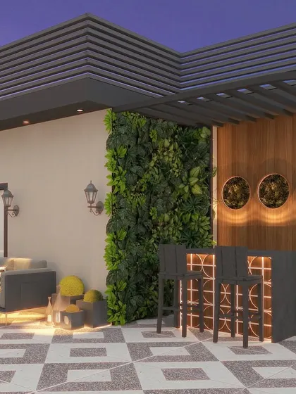 The bar area of the terrace, flanked by vertical gardens and featuring a stylish, illuminated bar counter.