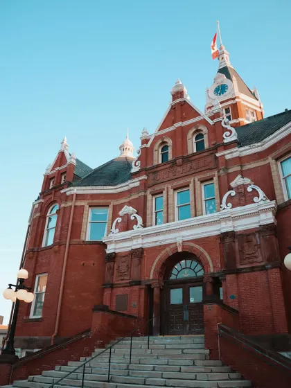 A detailed shot of the beautiful red-brick architecture of Stratford's City Hall.