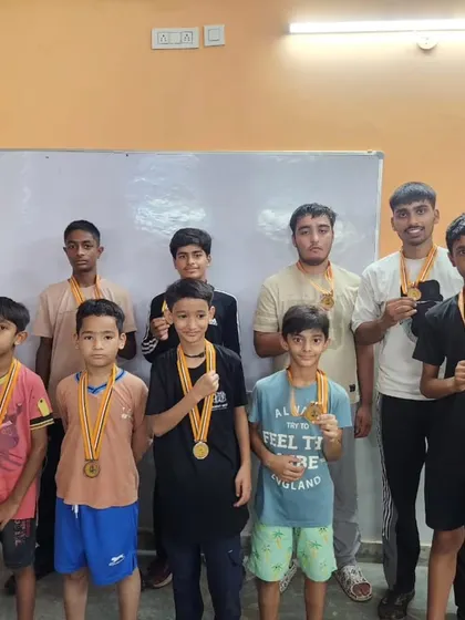 Our students showing off their hard-earned medals. Each one is a symbol of their dedication to the sport of boxing.