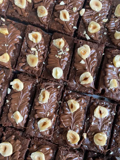 A close-up of my Nutella brownies, topped with toasted hazelnuts. The combination of rich chocolate and nutty flavor is just divine.