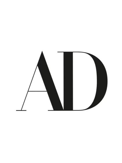 The Architectural Digest logo from the feature, signifying the project's recognition.