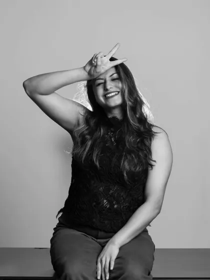Another example of capturing personality in the studio. This fun and lighthearted black and white photo shows a different side of the subject.