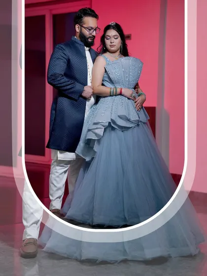 A series of portraits of a couple in blue-themed outfits, capturing their engagement on a staircase and in posed shots.