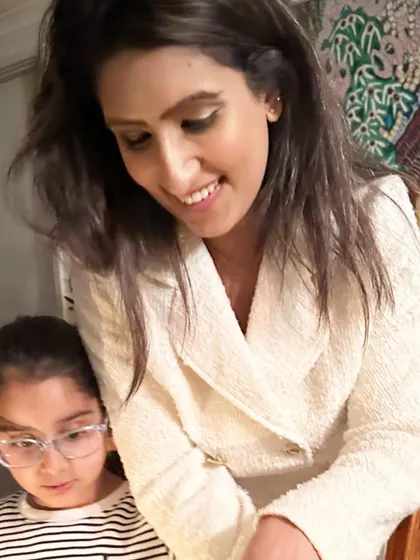 With my little one. My journey as a mother and a yogi are intertwined. I believe that understanding ourselves and our own energy is the first step to guiding our children with love and patience.