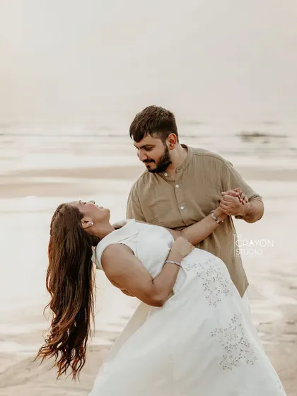 A playful dip during their dance on the beach. I always encourage couples to be themselves, because that's when the real magic happens.
