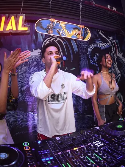 The DJ booth becomes a stage for our guest acts. It's an all-in-one performance space.