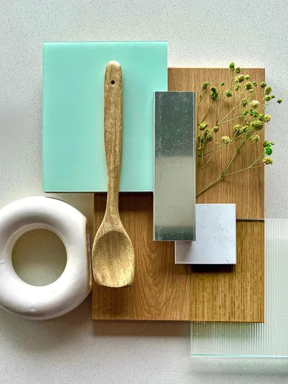 A mood board for 'The Turquoise Treasure' kitchen, showing the combination of turquoise, wood, and patterned tiles.