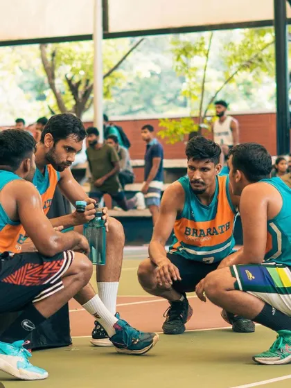 A strategy huddle during a timeout at the INBL 3x3 tournament.