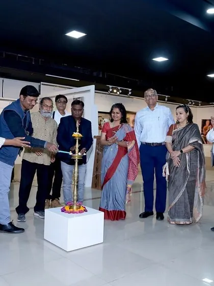 Participating in the lamp lighting ceremony for a group exhibition at Raja Ravi Varma gallery in Pune.