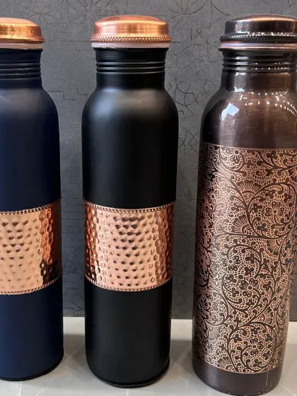 I also offer premium copper bottles, known for their health benefits. This collection shows matte, hammered, and printed designs.
