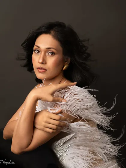 Another stunning portrait from the giveaway session. The composition and her pose create a high-fashion, magazine-worthy image that is both elegant and powerful.