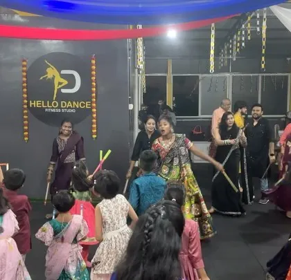 A wide view of our studio filled with dancers during the Navratri celebration. We can accommodate large groups for festive event choreography.