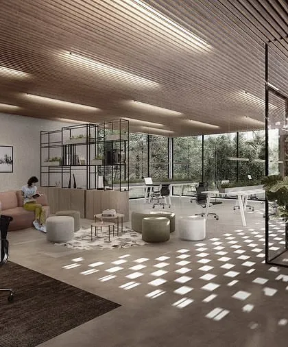 The co-working space within the Kolgaon clubhouse. Perforated brick screens and a slatted timber ceiling filter the light, creating a comfortable and inspiring environment that feels connected to the surrounding landscape.